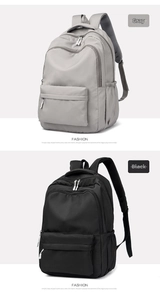 Detail of gray and black minimalist backpacks with breathable mesh padded shoulder straps