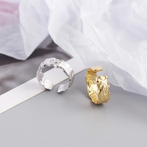 Detailed view of S925 sterling silver rings with irregular tin foil lava texture finish