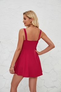 Rear view of red strapless mini dress showing slim fit back tailoring and waistline