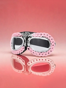 Detailed view of pink frame goggles with silver metal emblem and stylish chain edge