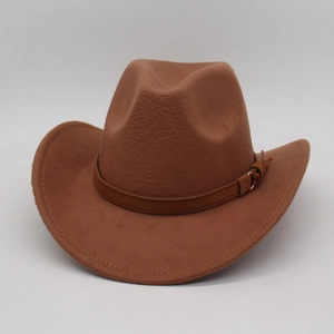 Detail of a brown wool felt cowboy hat featuring a thin leather band and metal buckle strap