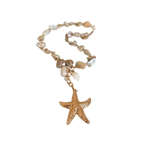 Beaded starfish and pearl necklace with golden pendants for casual beach vacation style