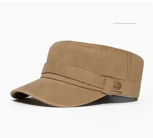 Detailed macro view of khaki cotton canvas texture and bronze metal button on army cap