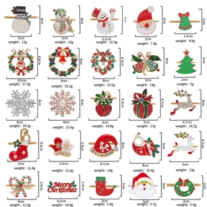 Macro display of assorted metal Christmas napkin rings with dimensions and weights