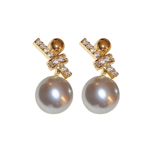 Elegant gold knot earrings with grey pearls and sparkling zircon accents for women