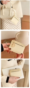 Chic beige textured leather mini wallet with gold zipper shown in lifestyle scenes