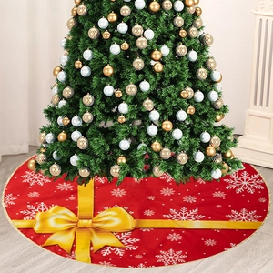 Red Christmas tree skirt with golden edges and festive bow snowflake patterns