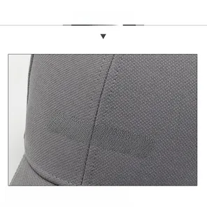 Close-up of grey baseball cap showing breathable mesh fabric and 3D NLSFASHION logo