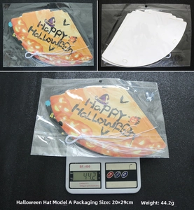 Flat lay of Halloween pumpkin paper party hats with elastic bands for DIY assembly