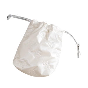 Quilted white PU leather drawstring bag with embossed butterfly pattern and silver cord