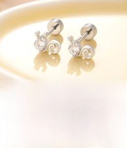 Detailed view of silver cat screw stud earrings with cubic zirconia and flat back