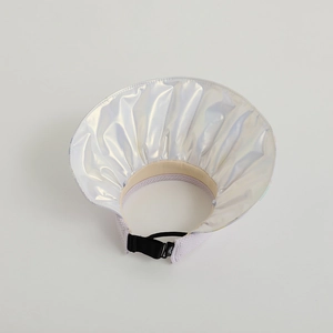Detail of adjustable elastic strap and buckle on kids sun hat with silver brim