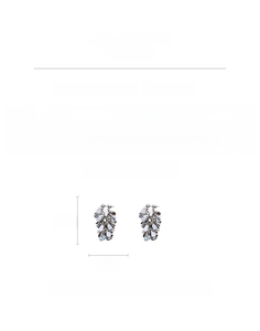 Detailed view of teardrop leaf tassel earrings featuring copper zircon and 10.5g weight