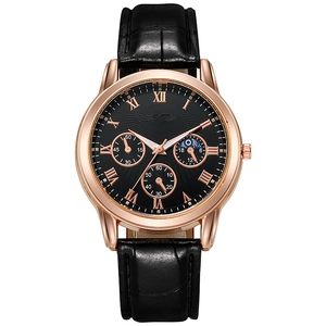 Detail of men's business watch with black textured leather strap and rose gold roman dial