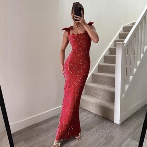 Elegant red lace maxi dress featuring shoulder bow details and a slim fit silhouette