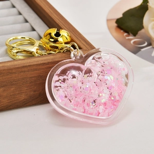 Rosa Acryl-Herz-Schlüsselanhänger mit Glitzer, goldener Glocke und Karabinerhaken