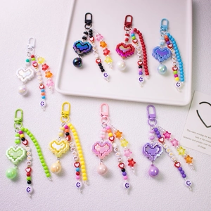 Colorful pixel heart keychains with LOVE letter beads and bells in eight vibrant colors