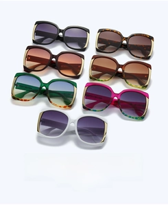 Detailed display of square oversized sunglasses in multiple fashion colors and patterns