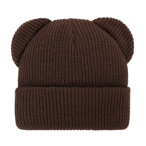 Close-up of brown knit baby hat featuring cute bear ears and thick ribbed texture