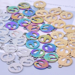 Polished stainless steel footprint charms in gold, silver, and rainbow colors for DIY jewelry