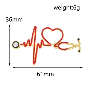 Medical enamel brooch with red heart and gold stethoscope, size 61x36mm, 6g weight