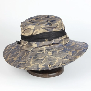 Detail of outdoor sun hat with breathable mesh and adjustable toggle in camo print