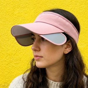Pink sports sun visor with retractable grey side wings for outdoor face protection
