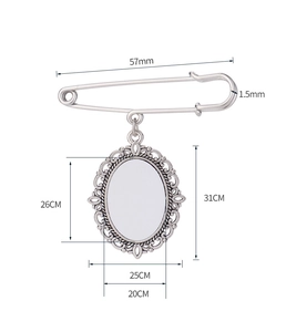 Detail view of vintage sublimation brooch pendant with dimensions and ornate lace edging