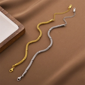 Bamboo-style titanium steel woven mesh bracelets in gold and silver with lobster clasp
