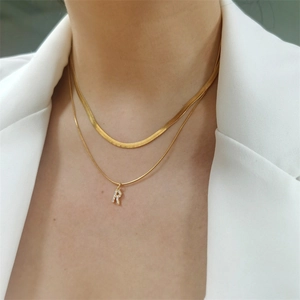 Double-layered gold titanium steel flat snake chain necklace with crystal letter R pendant