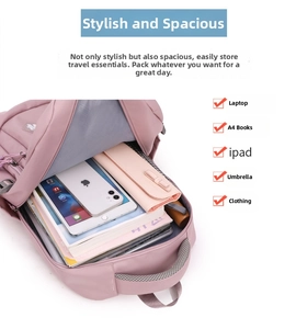 Pink travel backpack showing interior storage space with dedicated laptop compartment