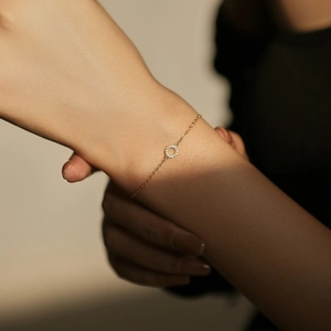 Minimalist S925 sterling silver gold bracelet featuring a delicate pavé zircon hollow circle