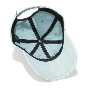 Detailed interior of light blue baseball cap showing black inner lining and adjustment buckle