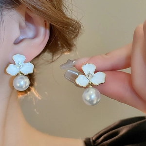 Vintage flower pearl earrings with crystals and white enamel in a classic gold setting