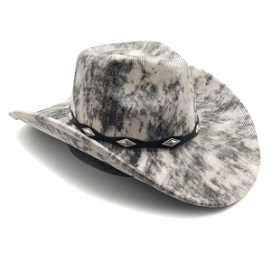 Close-up of vintage crackle texture felt with leather rivet band on cowboy hat