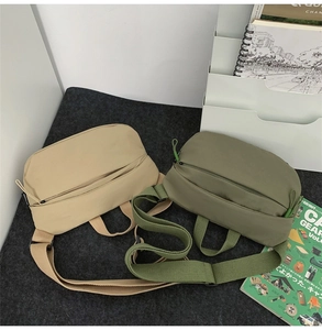Nylon crossbody bags in khaki and army green colors with adjustable wide shoulder straps
