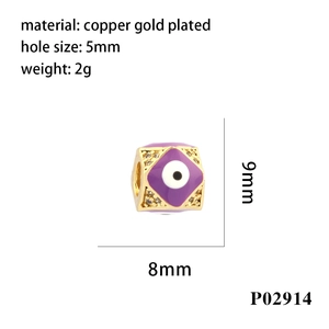 Detail of 8mm purple enamel evil eye bead in gold plated copper with cubic zirconia