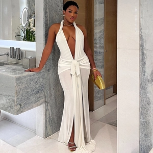 Elegant white halter neck backless long dress with V-neckline and high slit detail
