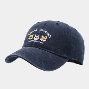 Detail of navy cotton baseball cap featuring high-quality colorful animal embroidery