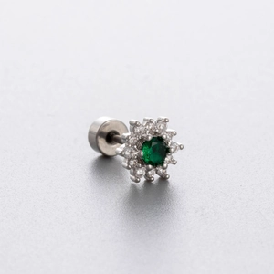 Silver titanium steel stud earring featuring green opal stone and floral halo