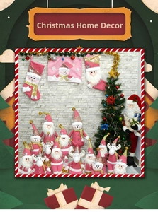 Pink Christmas gnomes and stockings home decor set against a stone wall background