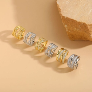 Set of six gold and silver geometric hollow rings with sparkling cubic zirconia in open design