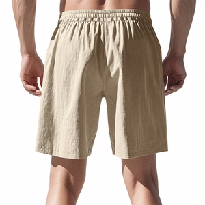 Rear view of khaki linen drawstring shorts showing the waist texture and fabric drape