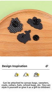 Detailed back view of enamel pins showing secure metal butterfly clutches and textured finish