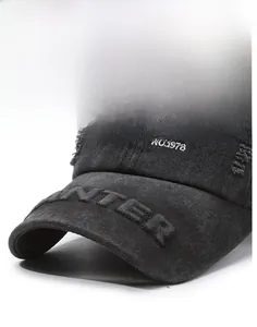 Detailed macro view of vintage washed baseball cap with 3D embroidery and distressed edges