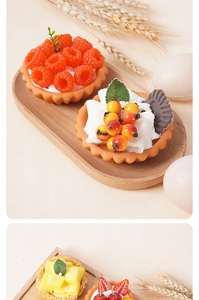 Detailopname van realistische fruittaartjes met aardbeien, mango en diverse bessen