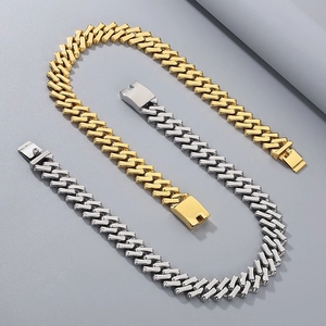 Detailed view of 20mm Cuban link bracelets in gold, silver, and mixed metallic finishes