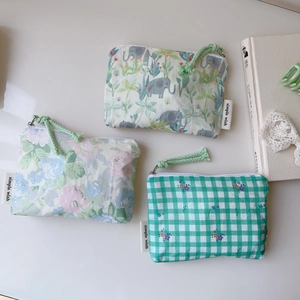 Trois pochettes en coton à motifs feuilles et éléphants avec fermeture à glissière