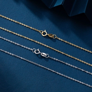 Detailed macro shot of S925 sterling silver chain lobster clasp in gold and silver finish