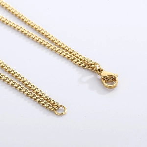 Detail showing gold stainless steel double layered chain with secure lobster clasp closure